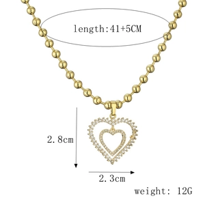 Detailed dimensions of gold bead chain necklace with crystal paved heart pendant