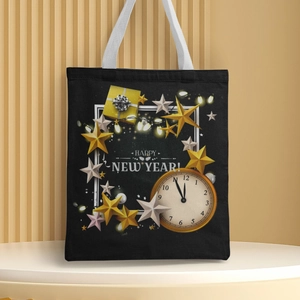 Detail of black canvas tote with Happy New Year clock print and gold star pattern
