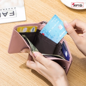 Pink leather RFID-blocking mini trifold wallet for women with multiple card slots