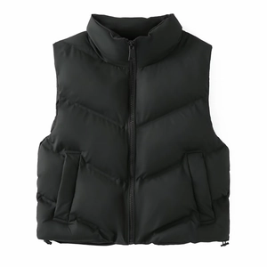 Detail of black stand-collar padded vest featuring waterproof glued seams and matte texture