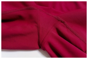 Macro detail of high-waist yoga shorts featuring professional flatlock stitching seams