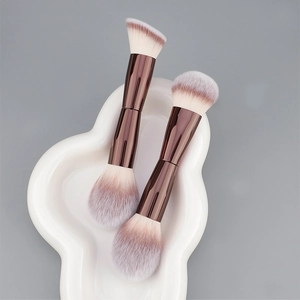 Dual-ended makeup brushes with purple fiber bristles and rose gold metallic handles