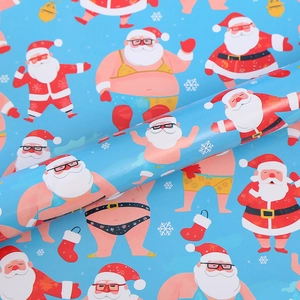 Funny gag Christmas gift wrapping paper with blue background and bikini Santa pattern