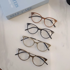 Retro round anti-blue light glasses frames in amber black and green colors