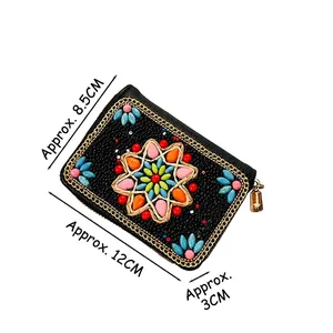Bohemian beaded coin purse with colorful floral patterns and a metal zipper closure
