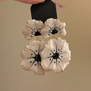 Vintage enamel ginkgo flower drop earrings with cream petals and gold metal finish