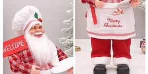 Detail of Santa chef doll with Welcome sign and Merry Christmas embroidery detail