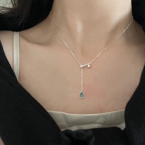 Elegant S925 sterling silver Y-shaped necklace with a blue teardrop pendant on model