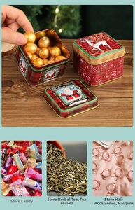 Detail view of festive tin storage boxes for Christmas candies, chocolates and small gifts