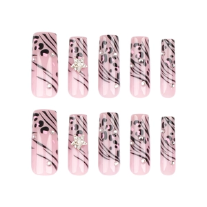 Pink and black leopard print press-on nails with silver stars and rhinestone details