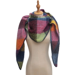 Close-up of triangle plaid scarf shawl with wool blend texture and whipstitch edge