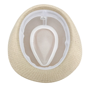 Close-up of the breathable paper mesh lining and internal size label for the straw fedora