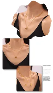Detail of a layered 18k gold plated necklace with a horse pendant on a female model