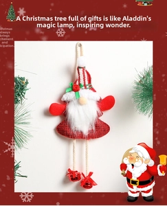 Detailed close-up of cloth gnome Christmas ornament with bells and striped hat