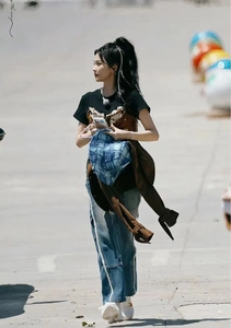 Street style view of denim hair accessory beads and cord styles on famous actress