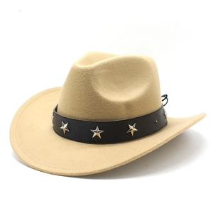 Detail of camel wool cowboy hat with black leather band and silver star studs decoration