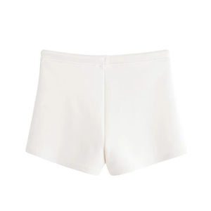 Flat lay of white casual knit shorts with minimalist design and elastic waist texture