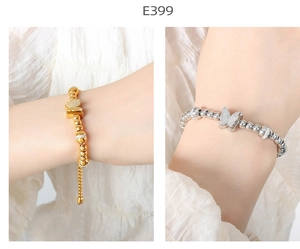 Detail view of gold and silver beaded butterfly bracelets with adjustable chains
