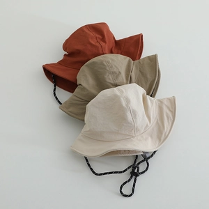 Three colors of quick-dry children's sun hats with wide brims and adjustable windproof cords