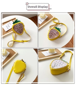 Detail view of yellow strawberry jelly bag for girls with glitter sequins and gold hardware