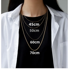 Size chart showing 45cm to 70cm gold titanium rope chains on a model for length reference