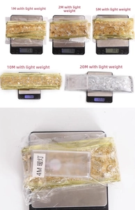 Detail showing weight specifications and close-up of LED ribbon Christmas lights with battery box