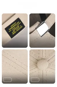 Detailansicht der beigen Baumwollkappe mit Webetikett und verstellbarer Metallschnalle