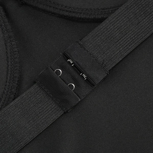 Detail shot of the secure double-row metal hook and eye closure on black formal dress