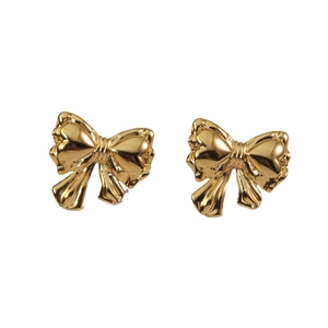 Polished golden bow stud earrings with intricate ribbon details on a clean white background