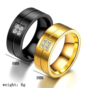 Macro view of 8mm titanium steel rings with zircons showing weight and width parameters