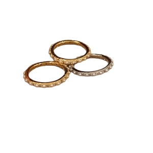 Three-piece minimalist 14K gold plated rings set featuring white pearls on white background