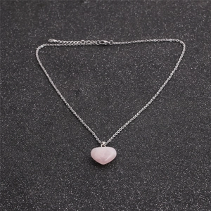 Polished pink crystal heart pendant necklace with elegant silver-tone chain