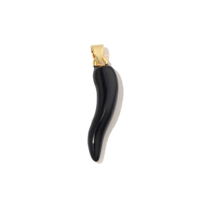 Macro detail of a black Italian Cornicello chili charm with a polished gold clasp