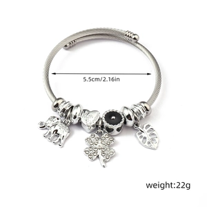 Twisted silver bracelet featuring elephant and heart charms with My Valentine engraving