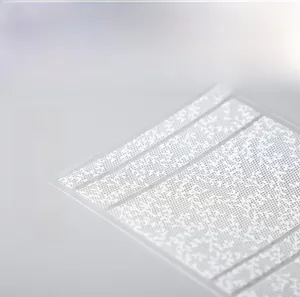 Macro shot of 5D white lace flower nail stickers with ultra-thin adhesive backing