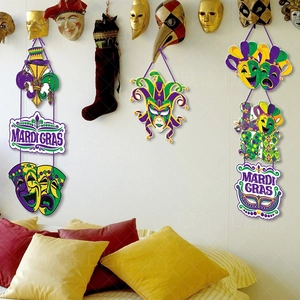 Detail of Mardi Gras masquerade masks wall hanging decoration in purple, green and gold colors