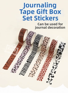 Close-up of 6-roll animal print washi tape set with tiger, leopard, and zebra patterns