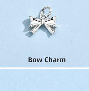 Close-up of a 925 sterling silver bow charm with high-polished finish for DIY jewelry