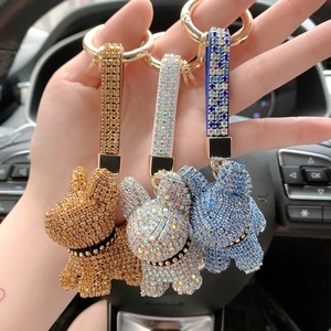 Portachiavi a forma di bulldog francese con strass scintillanti in oro, blu e bianco