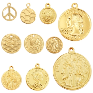 Golden coin-style metal pendants featuring embossed Queen Elizabeth and Liberty designs