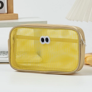 Yellow mesh storage bag with cartoon eye patch, rectangular design and zipper closure