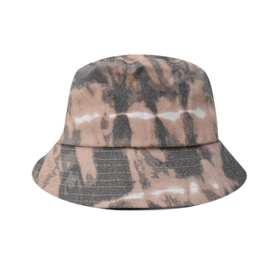 Detailed close-up of the tie-dye pattern texture and stitching on the wide brim bucket hat