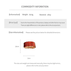 Detail view of red enamel vintage alloy bracelet with 18cm length and 2cm width