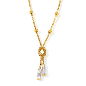Long stainless steel knot necklace with PVD gold plating and pavé diamond cylinders