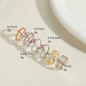 Set of 14K gold plated and silver rings with hollow design and zircon inlay details
