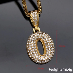 Macro shot of gold-plated iced out letter O pendant with detailed size measurements