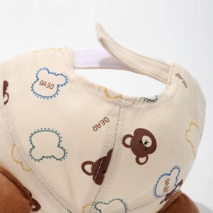 Gorra de béisbol de algodón beige para bebé con estampado de oso y cierre de velcro ajustable