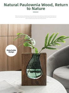 Close-up of detachable green glass vase with premium solid paulownia wood base
