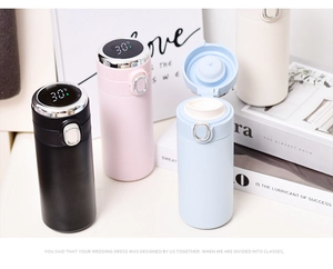 Detail of smart temperature display on stainless steel thermos caps in various colors