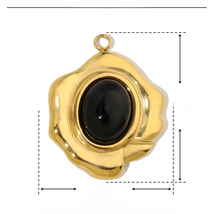 Detail view of gold-plated stainless steel teardrop pendant with black stone and size info